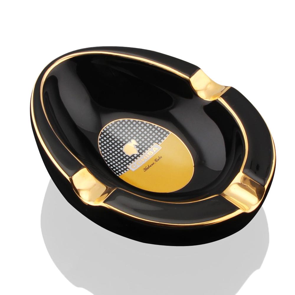 COHIBA Ceramic Cigar Ashtray Creative Design Beautiful Black And Gold Appearance Supports 3 Cigars For Entertaining Purposes.