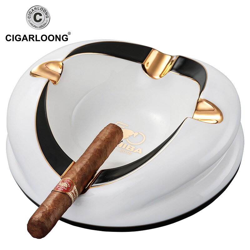 CIGAR ashtray ceramic fashion beautiful white design black trimmed and gold cigar holders.